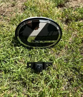 75301-46010 Lexus 2023 Rz450e Front Bumper Cruise Radar Sensor Applique Badge Trim Assembly