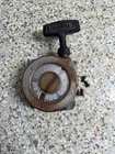 1986 Suzuki LTF230 Recoil Assembly Pull Starter 18100-18A11 Used. Price: $60.00.