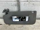 2022 Chevrolet SILVRDO25 Driver Side M.gray Cloth Sun Visor W/lighted Mirror Used. Price: $74.95.