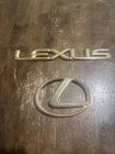 97 98 99 01 Lexus ES300 Gold Rear Emblem And Logo Oem Used. Price: $25.00.