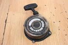 1986 Suzuki LTF230 Recoil Assembly Pull Starter 18100-18A11 Used. Price: $129.00.