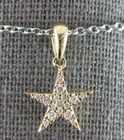 Estate .15CT Diamond 14KT Yellow Gold 3D Classic Star Love Floating Pendant Pre-owned. Price: $1187.52.