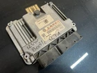 2012-14 Volkswagen Beetle Engine Control Unit Module Ecu 06J906027AG Used. Price: $135.00.
